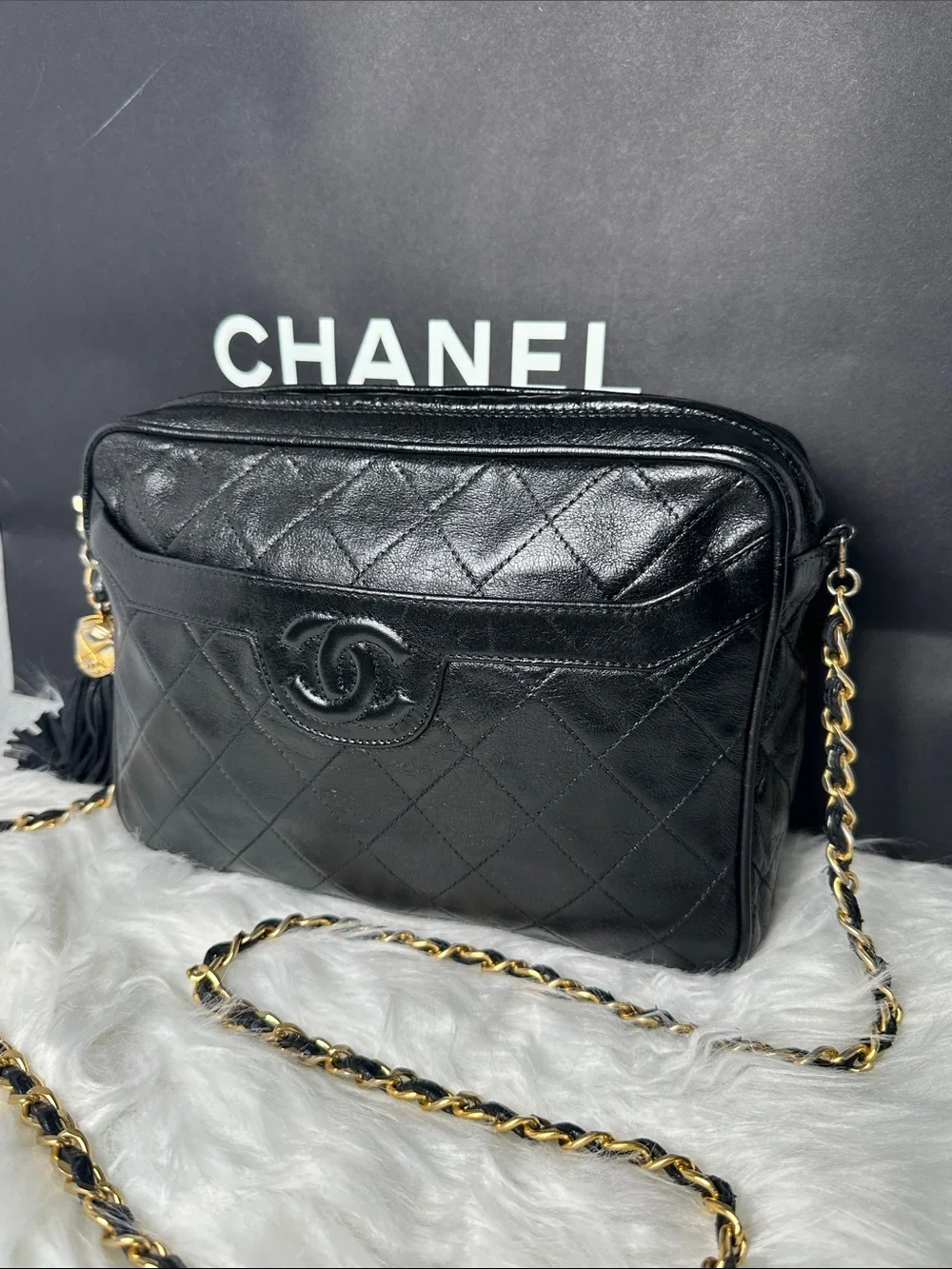CHANEL Black Quilted Lambskin Crossbody with Tassel and Chain